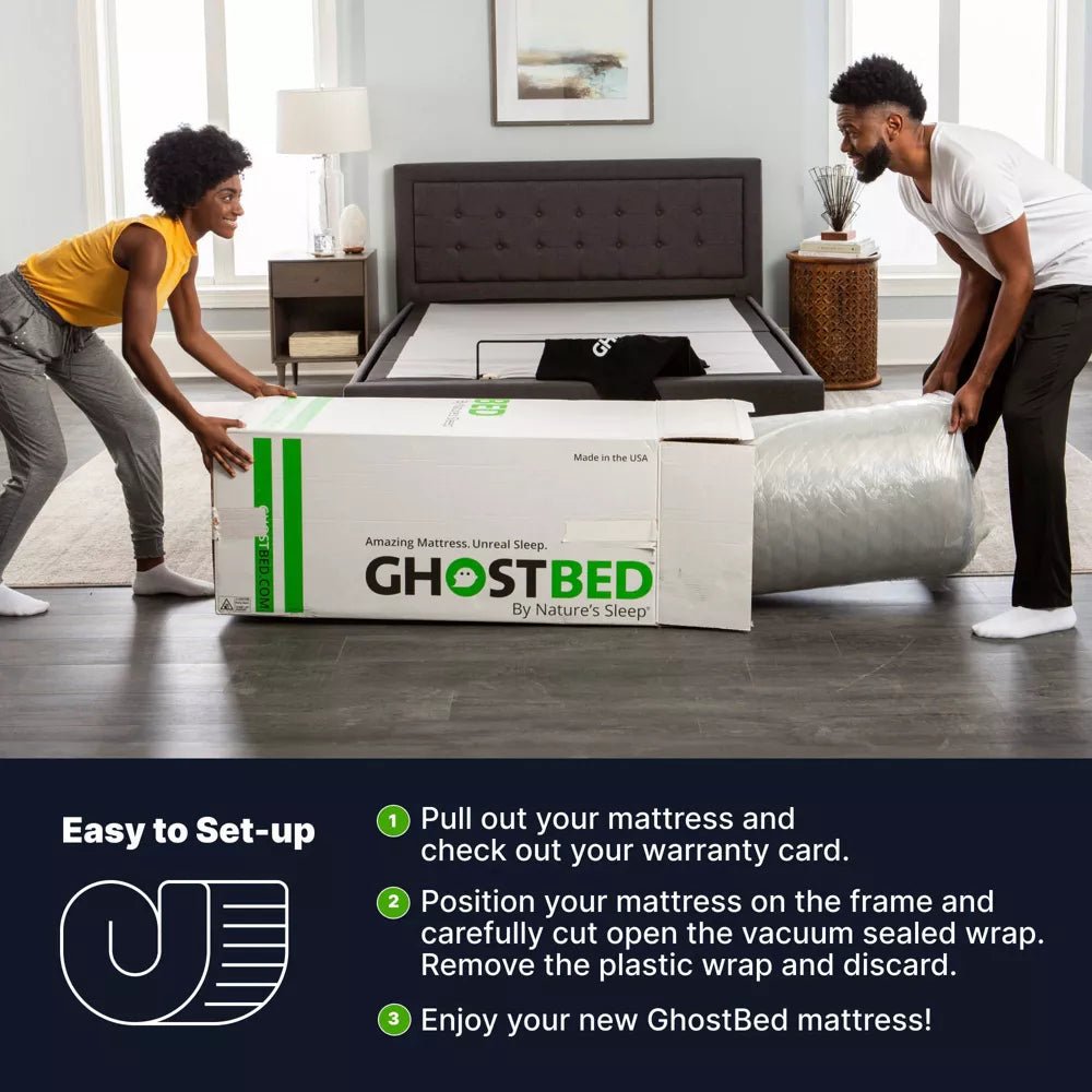 Two people unboxing a GhostBed mattress-in-a-box in a modern bedroom, demonstrating the easy setup and expansion of the hybrid bed.
