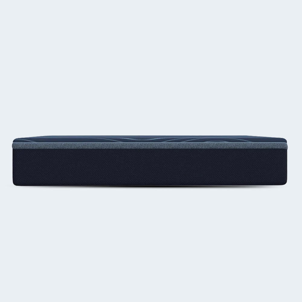 Minimalist side view of the South Bay 14-inch thick hybrid mattress highlighting its deep navy textured border and supportive height.
