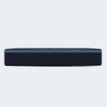Minimalist side view of the South Bay 14-inch thick hybrid mattress highlighting its deep navy textured border and supportive height.
