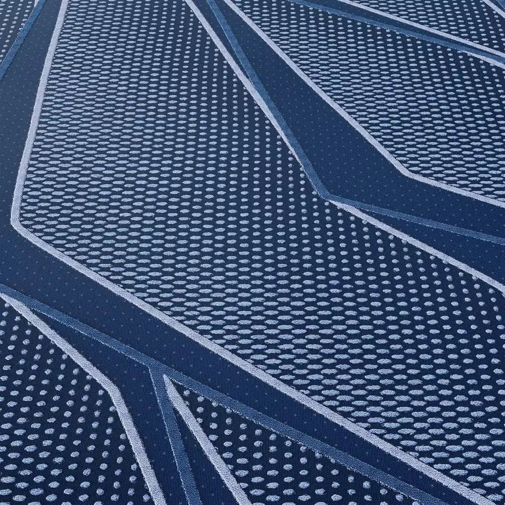 Close-up of the cooling geometric pattern on the Serta iSeries NXG 3500 firm hybrid mattress cover.
