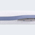 Close-up of the zipper on a BEDGEAR Balance Cuddle Curve pillow, revealing a washable cover design.