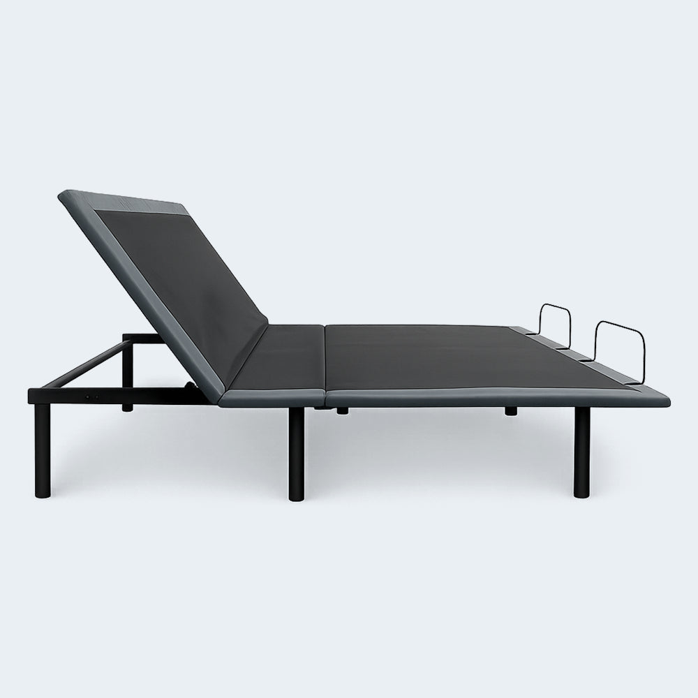 Profile view of the Customatic Dreamsense The Balance bed with the head elevated and foot section flat.
