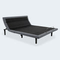 Customatic Opus smart bed base showing independent head and neck tilt adjustment for personalized sleep comfort.
