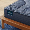 Close-up of Serta Perfect Sleeper X branding on the Knox Firm 13.5 inch hybrid mattress corner.
