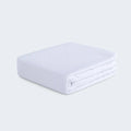 Folded white Hyper-Wool performance crib sheet by BEDGEAR for a clean, moisture-wicking nursery.
