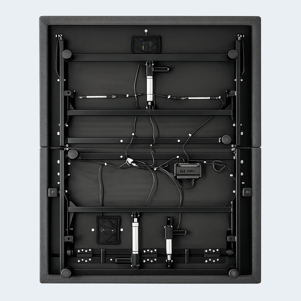 Detailed underneath view of the S1000 adjustable bed foundation showing the powerful dual-motor lifting system and durable steel frame construction.
