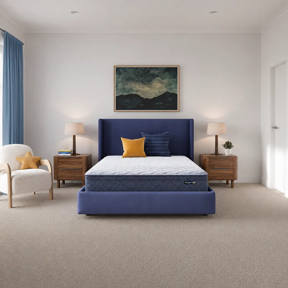 Serta Perfect Day 10 inch Plush Pillow Top Mattress styled in a contemporary bedroom for a restful night.
