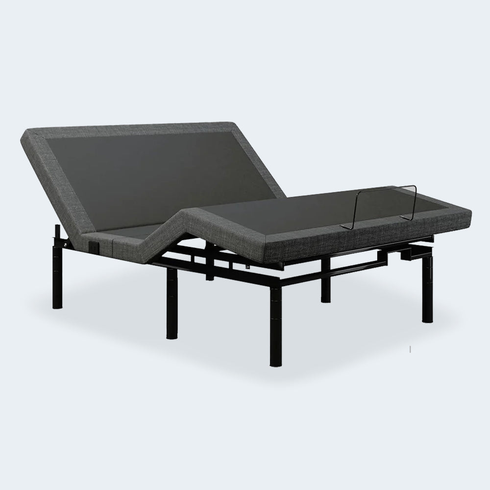 Three-quarter angled view of the iDealBed Smart 4iT adjustable power foundation with a secure mattress retainer bar.
