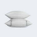Folded white BEDGEAR Hyper-Linen pillowcase set designed for superior breathability and temperature regulation.
