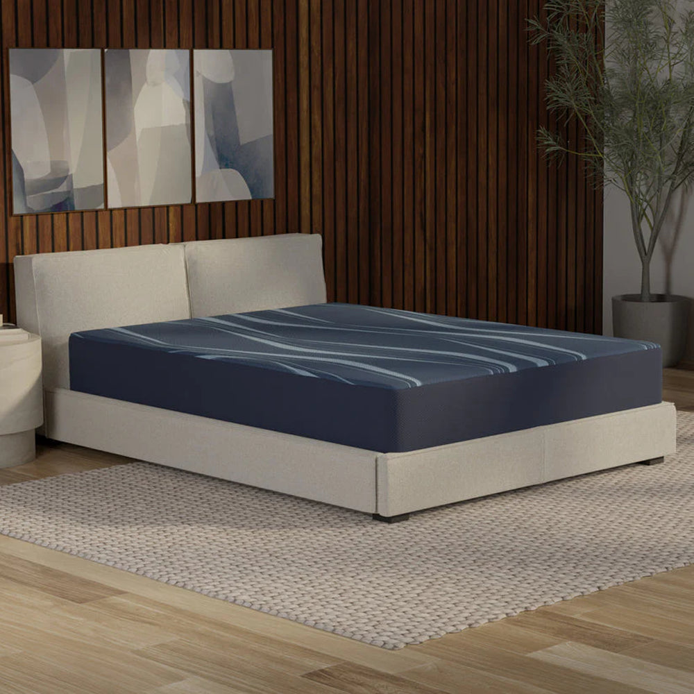 Three-quarter perspective of the Active Align 10-inch copper zoned foam mattress in a modern bedroom setting with wood-paneled walls.
