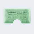 Top view of the green Malouf Peppermint Zoned Dough pillow core featuring an ergonomic shoulder cutout.
