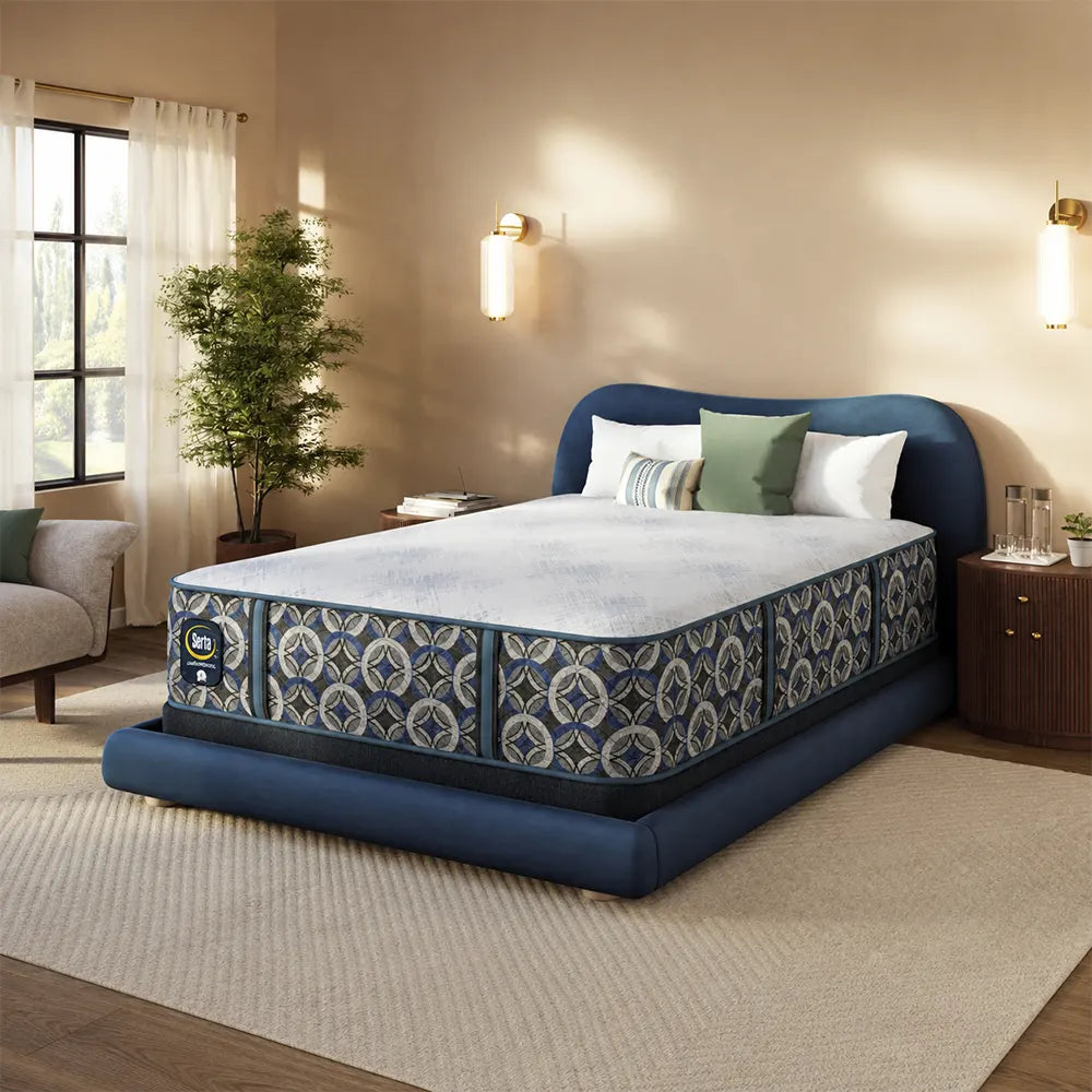 Luxury bedroom decor featuring the Serta Perfect Sleeper Cascade Bluff Hybrid Medium mattress.
