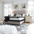 Modern bedroom featuring the breathable Ashley Chime 12 inch hybrid mattress for a cool sleep.
