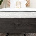 Close-up of the Ashley Sleep 6 inch mattress showing the soft quilted top and decorative wavy side border.
