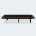 Side profile of the Comfort Premier Steel Adjustable Bed Base by Ashley in its neutral flat position showing the heavy-duty steel frame and legs.
