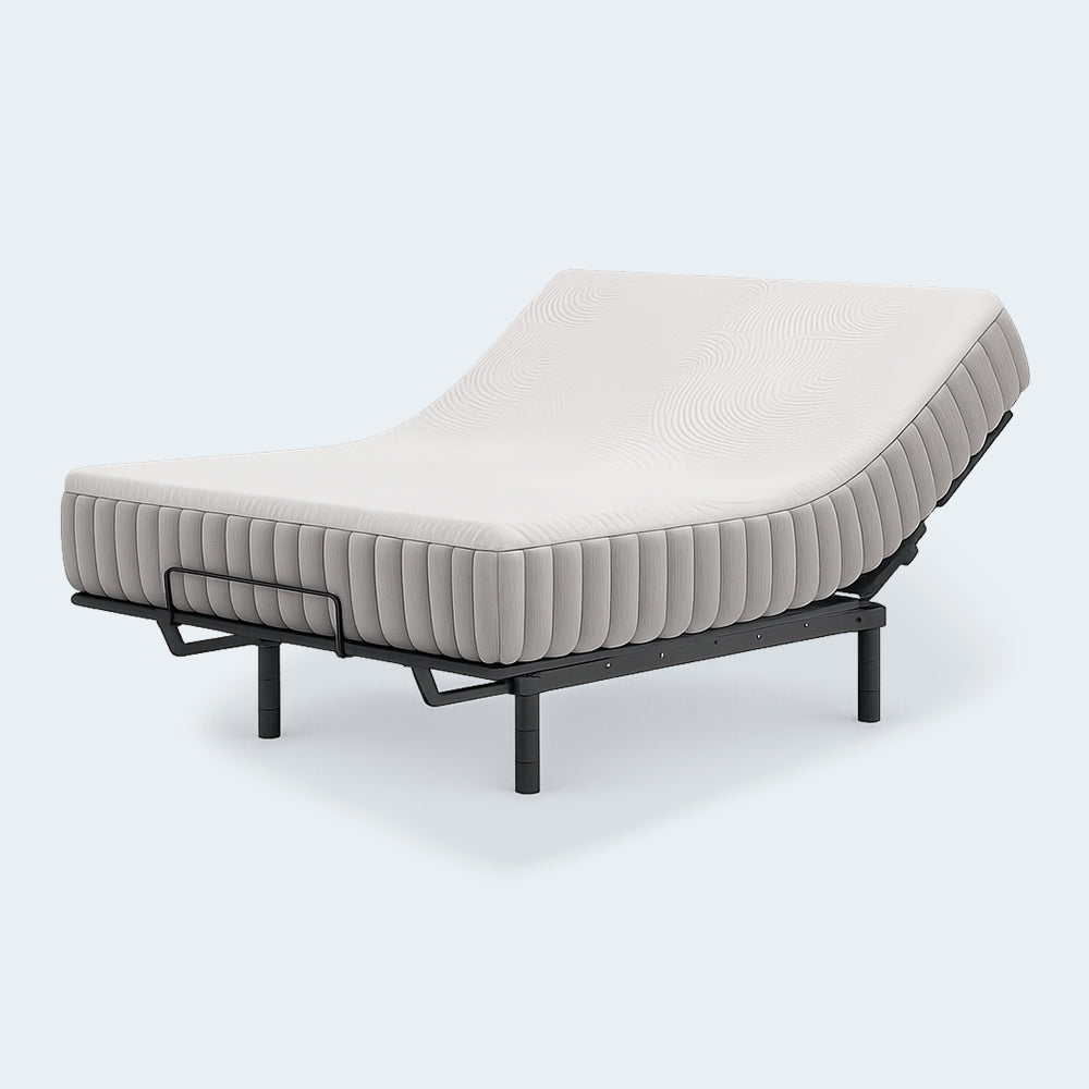 Side view of the Terra Sleep 12-inch mattress with the head section elevated on an adjustable bed frame, highlighting ergonomic support for reading or sleeping.
