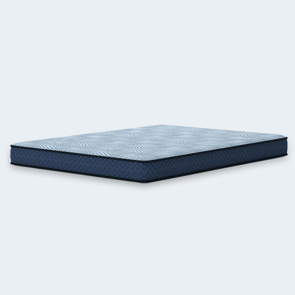 Perspective view of the Ashley Furniture Peak 2.0 8-inch Bonnell mattress highlighting the slim low-profile design and navy blue side panels.
