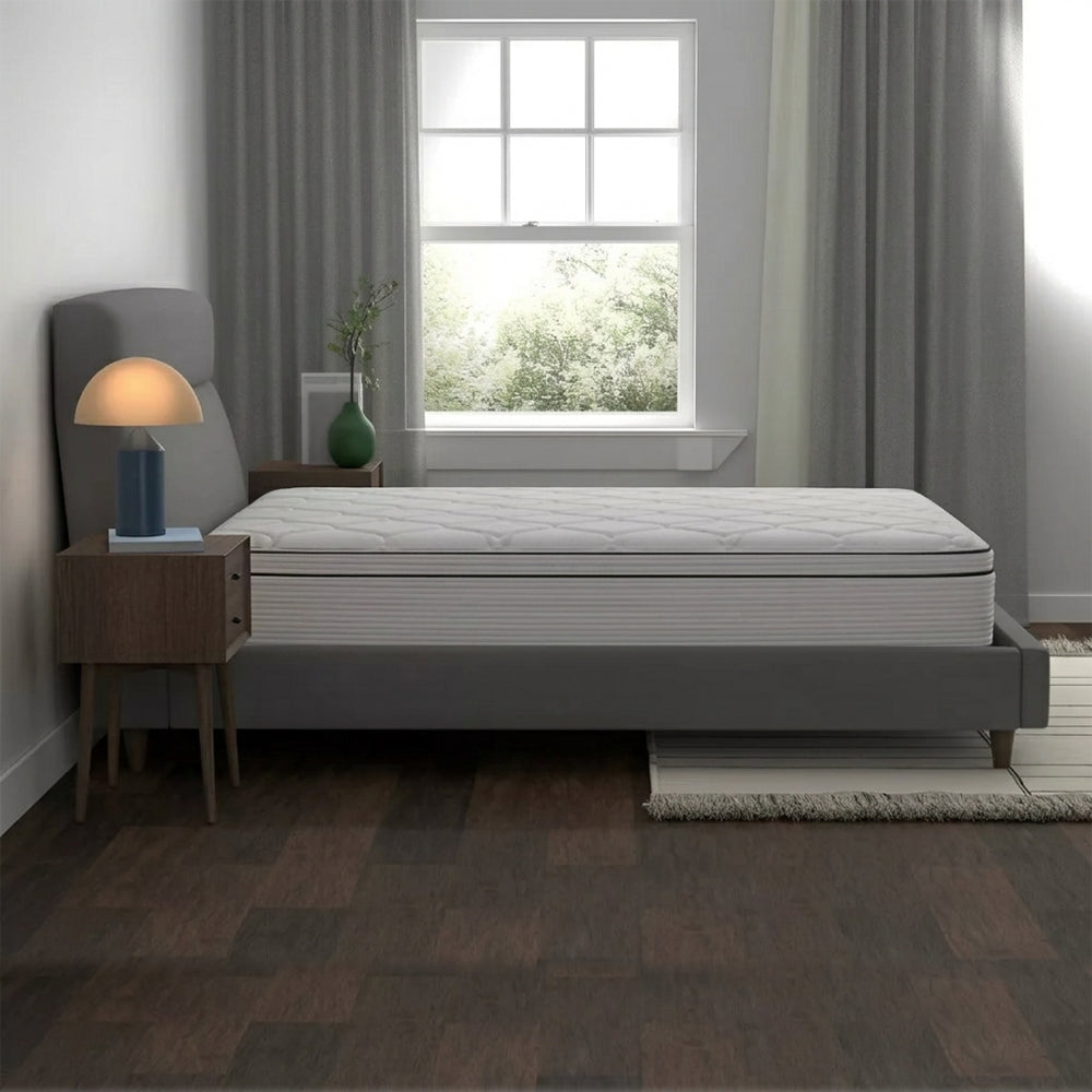 Side profile of the 10-inch American Bedding Cymbal Jingle mattress highlighting the luxury Euro top layer and supportive hybrid construction.
