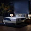 Nectar Classic Hybrid 12-inch Medium-Firm Mattress styled in a modern master bedroom on a contemporary grey upholstered platform bed frame.
