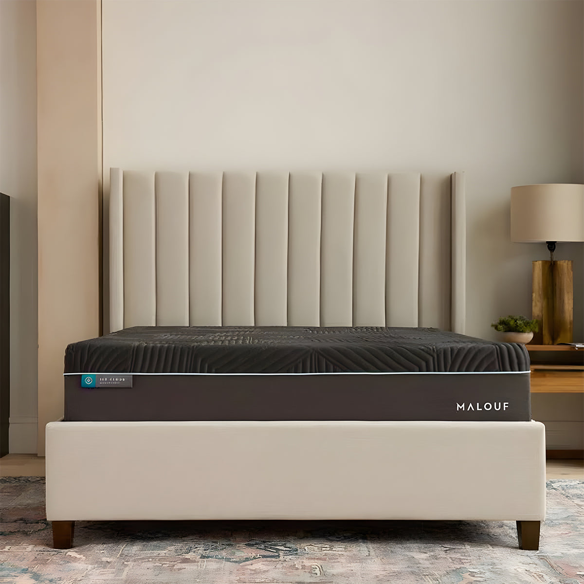Ice Cloud 14 inch Coolsync Hybrid Mattress in a modern bedroom setting with a cream wingback headboard.