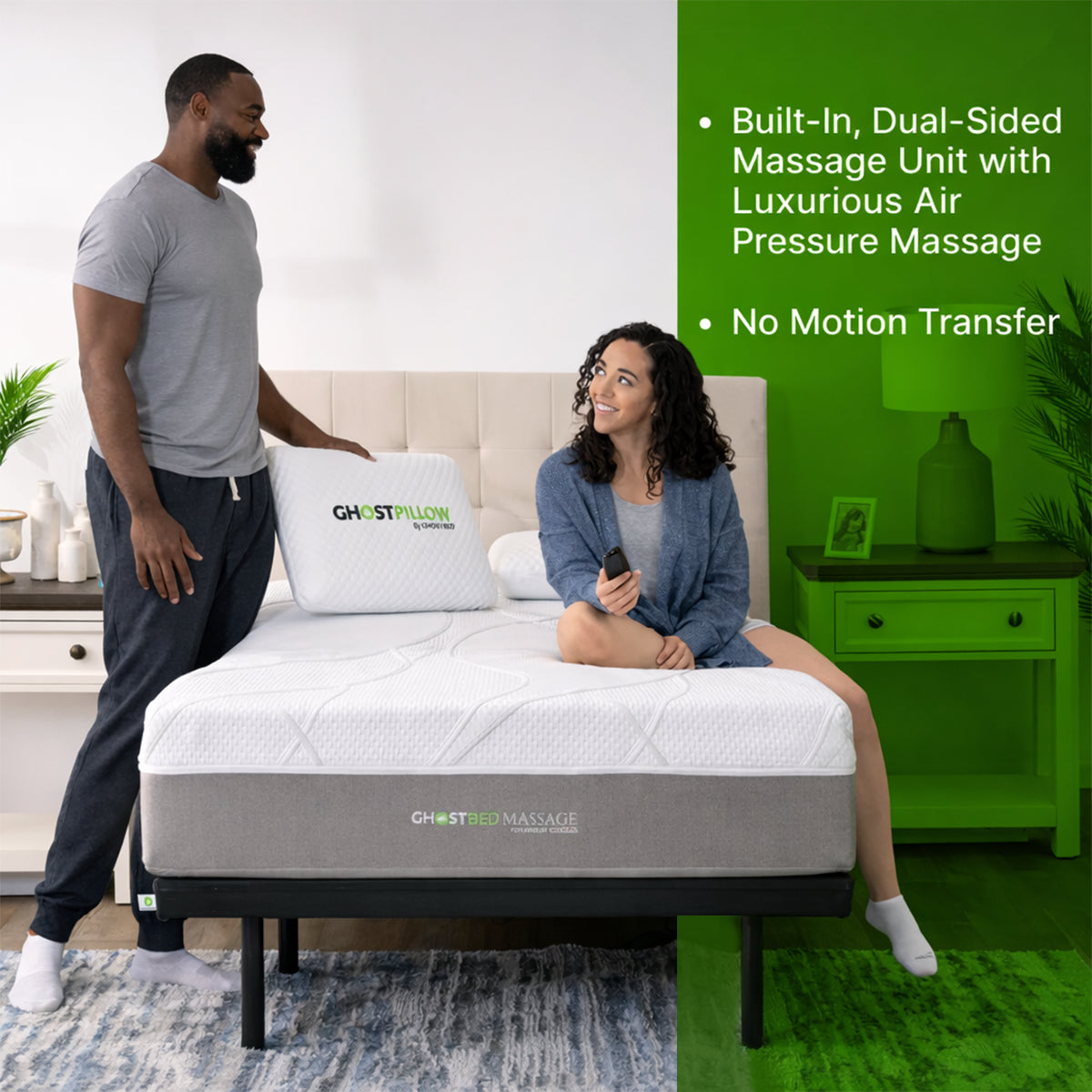 Couple testing the GhostBed Massage Mattress featuring dual-sided massage units and luxury air therapy tech.