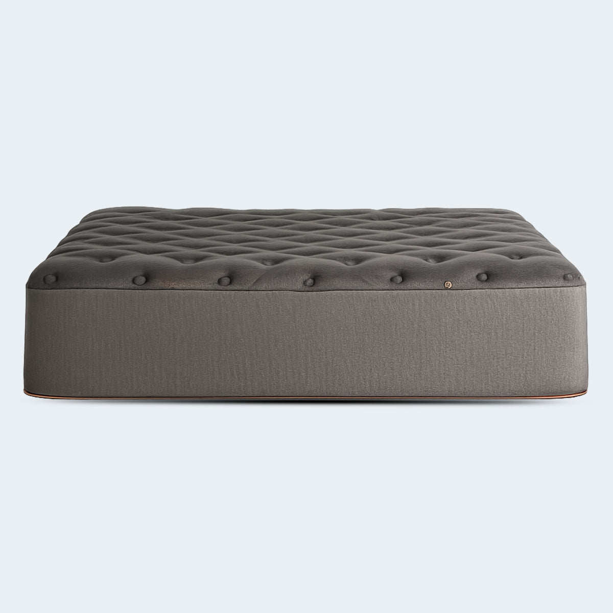 Profile view of the Tommie Copper Core Znergy 14-inch plush hybrid mattress featuring charcoal grey fabric and copper trim.
