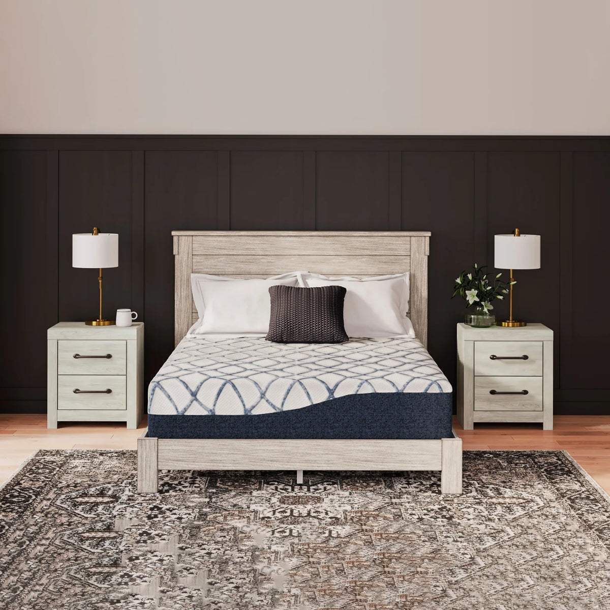 Chime Elite 2.0 Medium Plush Mattress by Ashley front view on a rustic wood bed frame in a modern bedroom setting.