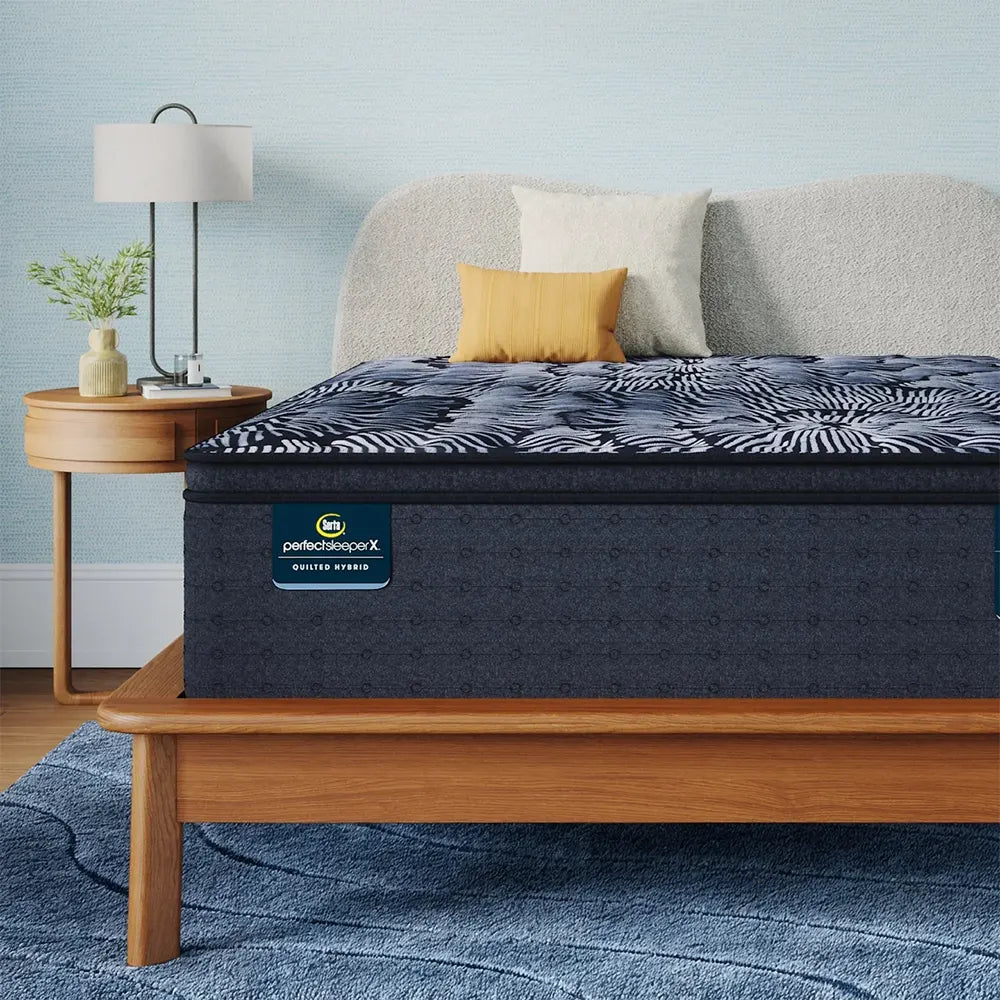 Luxury lifestyle bedroom featuring the supportive Serta Perfect Sleeper X Lexton 14.25 inch hybrid mattress.
