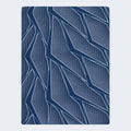 Close-up of Serta iSeries NXG 2500 branding and premium quilted fabric on a 12.5" hybrid mattress.
