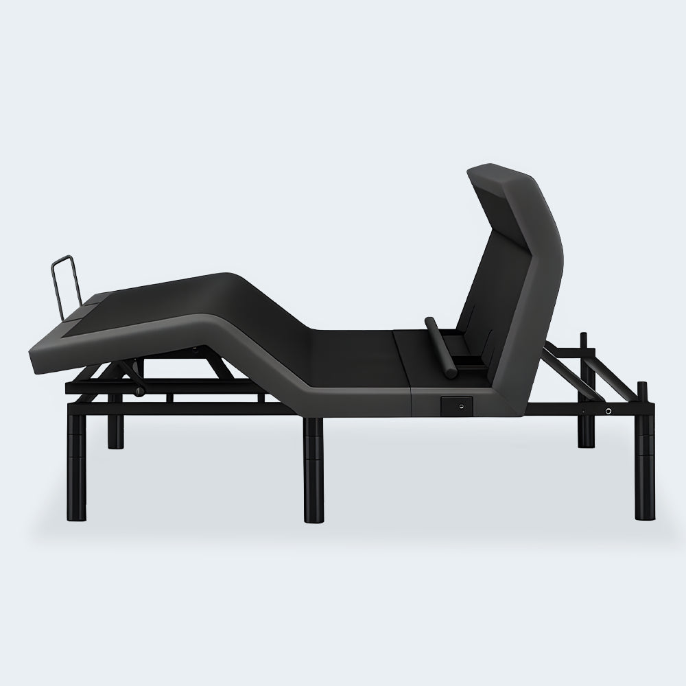 Side profile of the iDealBed Smart 7i adjustable bed in a contoured lounging position with maximum head and foot articulation.
