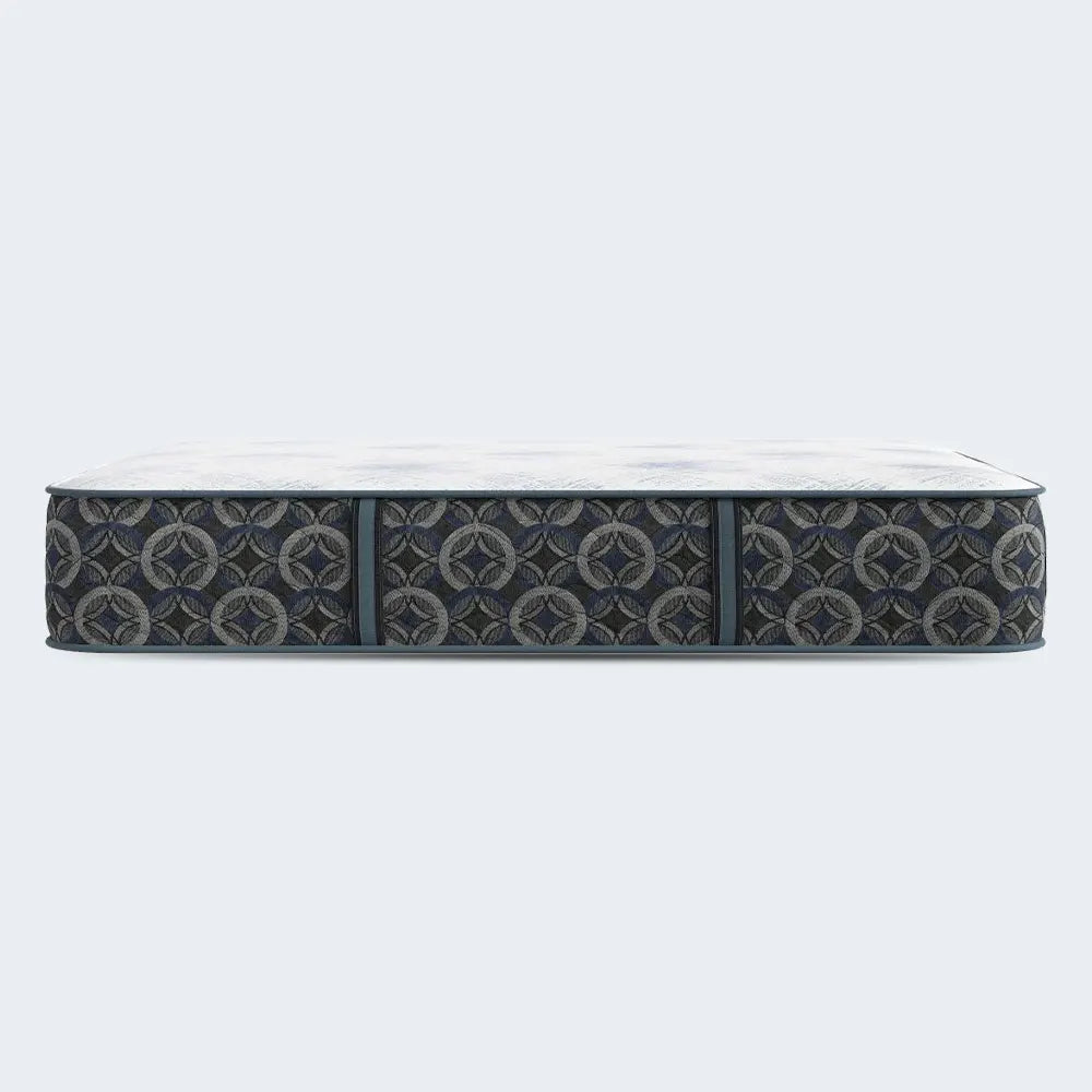 Profile view of the Serta Cascade Bluff Hybrid Firm mattress highlighting its thick 14.5 inch comfort profile.
