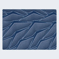 Top-down view of the Serta iSeries NXG 2500 mattress showing the moisture-wicking geometric cooling fabric.

