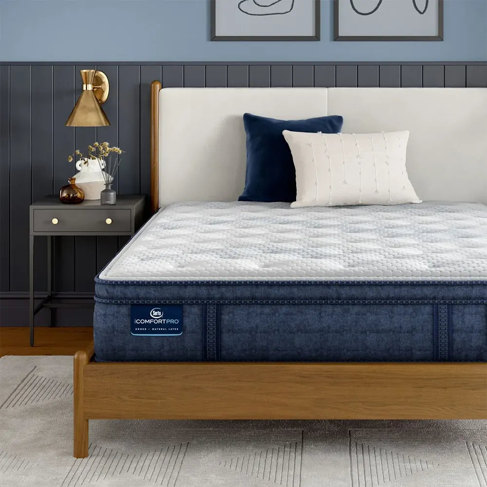 Serta iComfortPRO Quilted Dartmouth 15" plush pillow top mattress providing cooling and spinal support.
