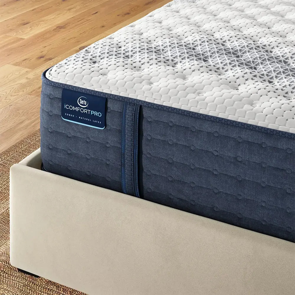 Corner detail of the Serta iComfortPro Kingston 14 inch firm mattress highlighting the premium quilted fabric.
