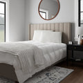 Modern bedroom with Malouf HyperChill cooling pillow protectors for an allergen-free sleep.
