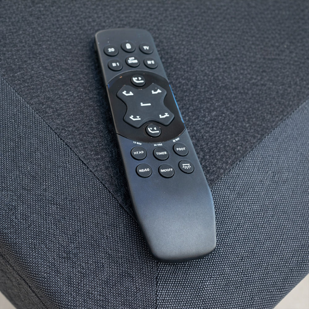 Wireless remote control for Customatic Dreamsense The Harmony featuring Zero Gravity, Anti-Snore, and massage settings.
