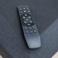Wireless remote control for Customatic Dreamsense The Harmony featuring Zero Gravity, Anti-Snore, and massage settings.
