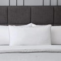 Front view of the Malouf Gel Convolution bed pillow with a breathable, moisture-wicking striped cover.
