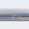 Close-up of the zippered cover on a gray BEDGEAR Flow Travel Pillow for easy washing and maintenance.
