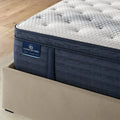 Serta iComfortPRO Buckingham mattress corner showing the thick latex foam pillow top construction.
