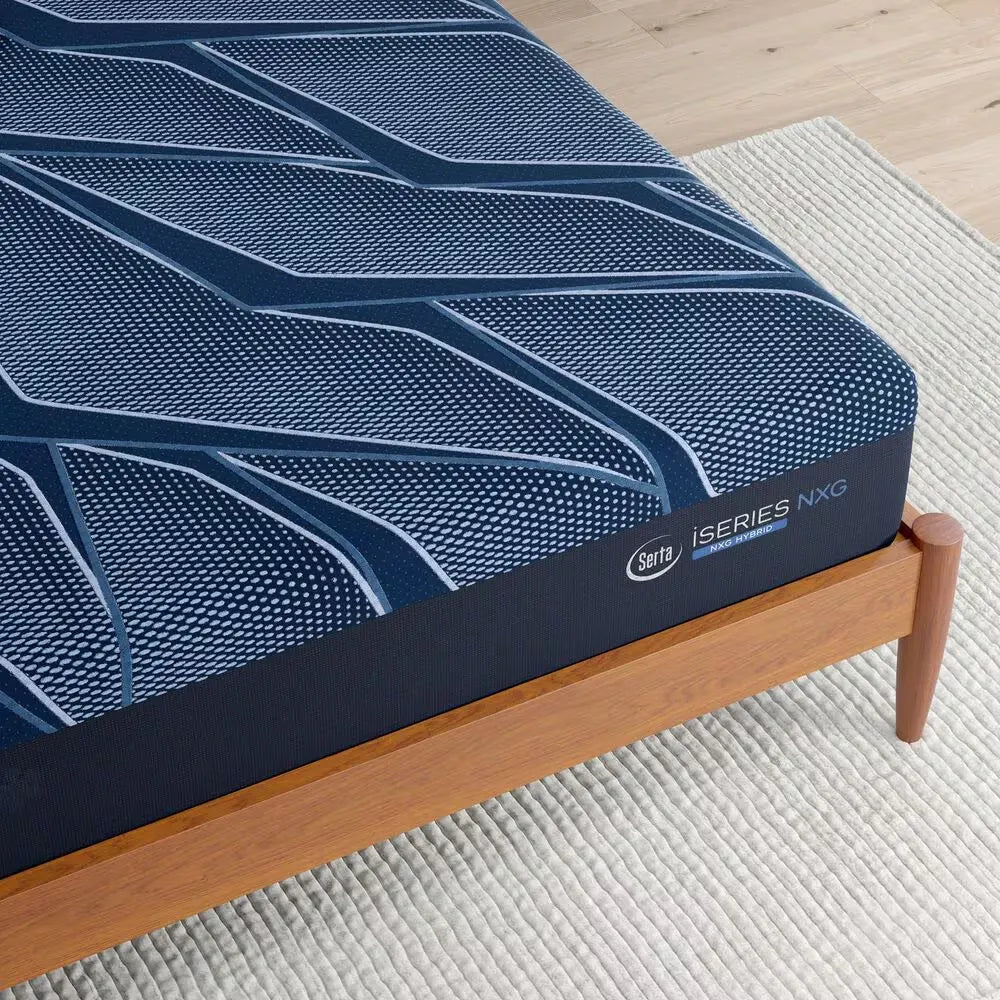 Close-up of the Serta iSeries NXG 2500 logo and premium quilted cooling fabric on the mattress corner.