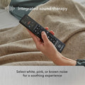 Integrated sound therapy feature on the Baselogic remote, offering white, pink, and brown noise settings for a soothing sleep experience.
