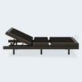 Side view of the Comfort Ultra Adjustable Base by Ashley showing head-up articulation for reading or anti-snore relief.
