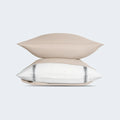 Stacked beige BEDGEAR Hyper-Wool pillows providing plush, natural comfort and enhanced durability.
