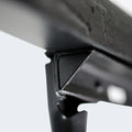 Close-up of a heavy-duty steel support bracket on the Malouf adjustable bed frame for durable mattress stability.