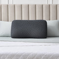 Malouf HexCurve memory foam pillow with a shoulder cutout design to reduce pressure for side sleepers.
