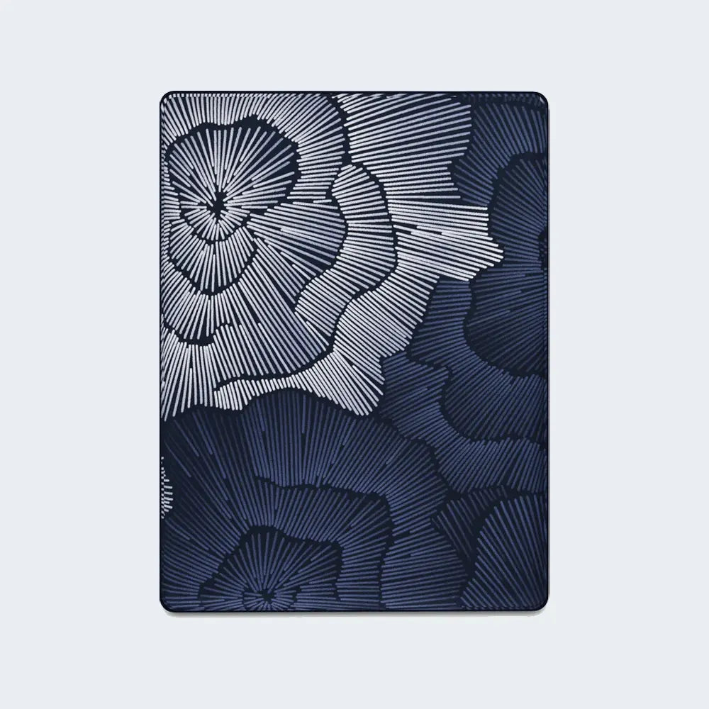 Top view of the Serta Perfect Sleeper X Prescott Hybrid Mattress cooling fabric with artistic blue pattern.
