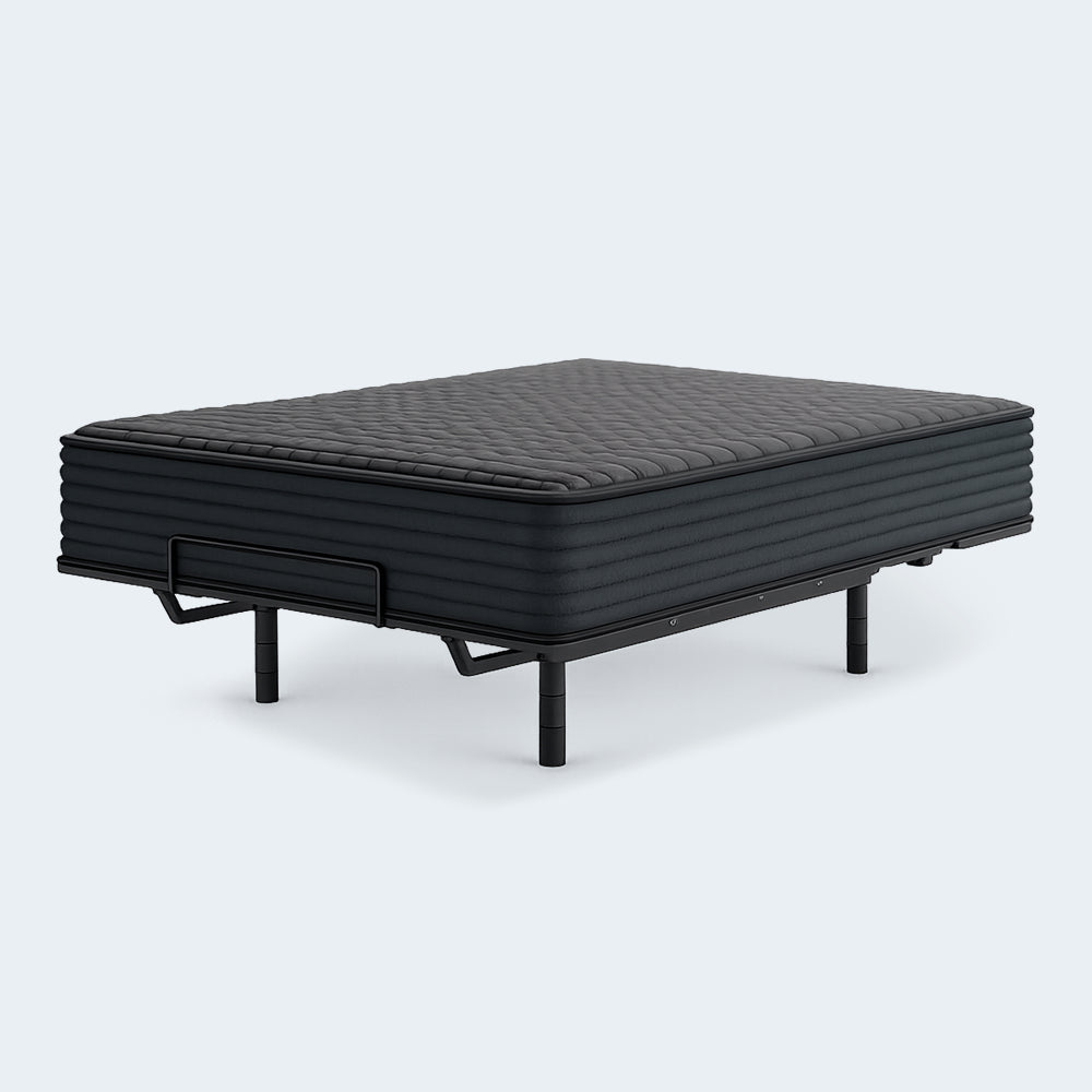12-inch Gray 1200 Hybrid mattress by Ashley displayed on a modern adjustable bed foundation for personalized comfort.
