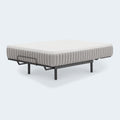 The Ashley Terra Sleep 12" Medium mattress shown on an adjustable power base foundation to illustrate its flexible construction and modern design.
