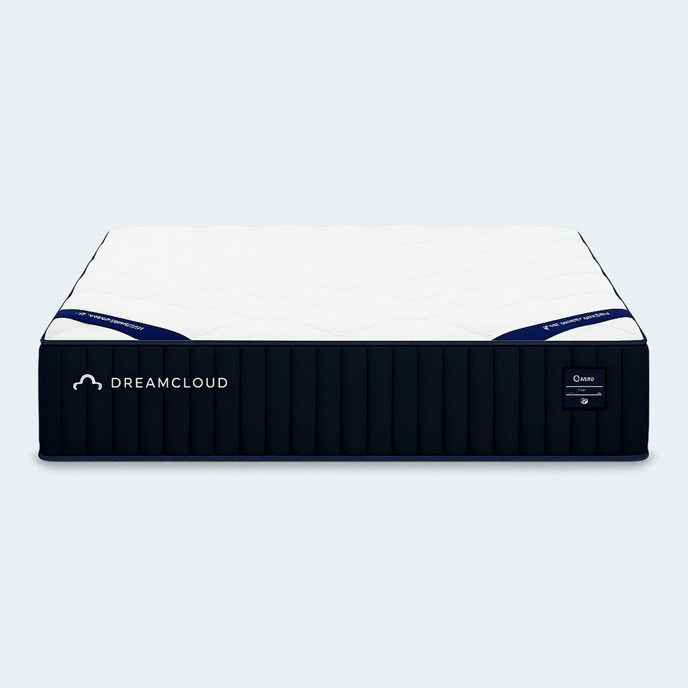 Frontal symmetrical view of the DreamCloud Classic 12-inch Medium Firm Hybrid Mattress highlighting the premium quilted cover and branding.